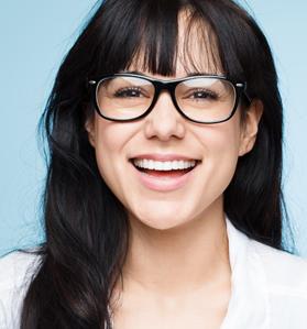 Smiling Girl With Glasses